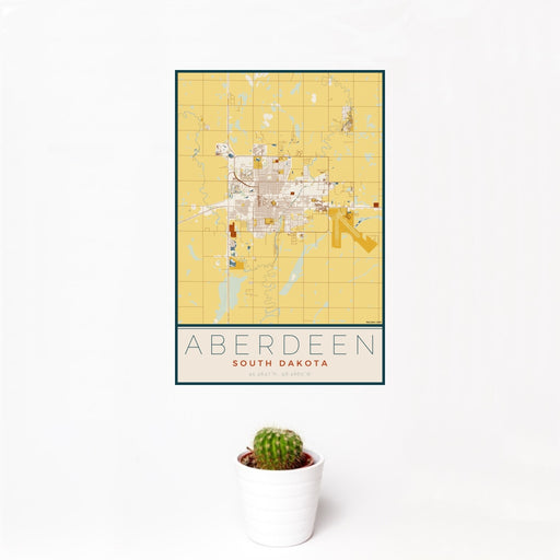 12x18 Aberdeen South Dakota Map Print Portrait Orientation in Woodblock Style With Small Cactus Plant in White Planter