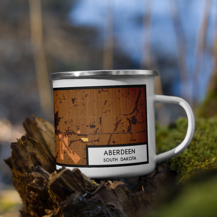 Right View Custom Aberdeen South Dakota Map Enamel Mug in Ember on Grass With Trees in Background