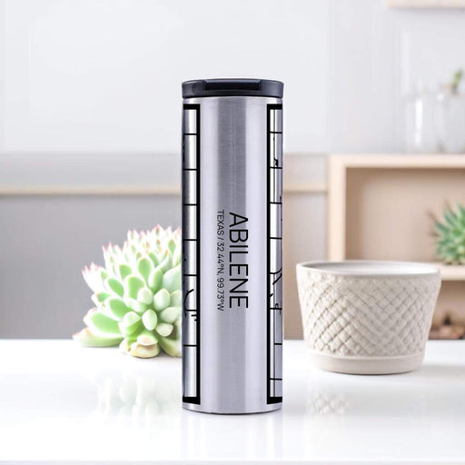 Abilene Texas Custom City Map Inscription Coordinates on 17oz Stainless Steel Insulated Tumbler in Tactile Lines with Succulent in Background