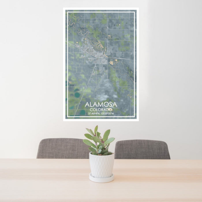 24x36 Alamosa Colorado Map Print Portrait Orientation in Afternoon Style Behind 2 Chairs Table and Potted Plant