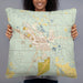 Person holding 22x22 Custom Alamosa Colorado Map Throw Pillow in Woodblock