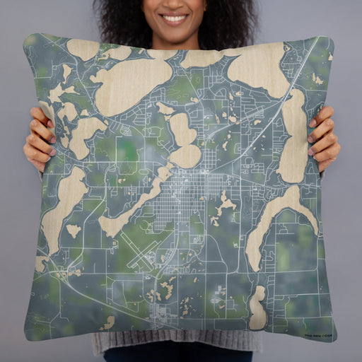 Person holding 22x22 Custom Alexandria Minnesota Map Throw Pillow in Afternoon