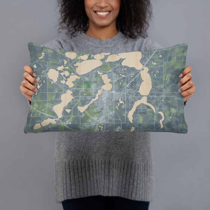 Person holding 20x12 Custom Alexandria Minnesota Map Throw Pillow in Afternoon