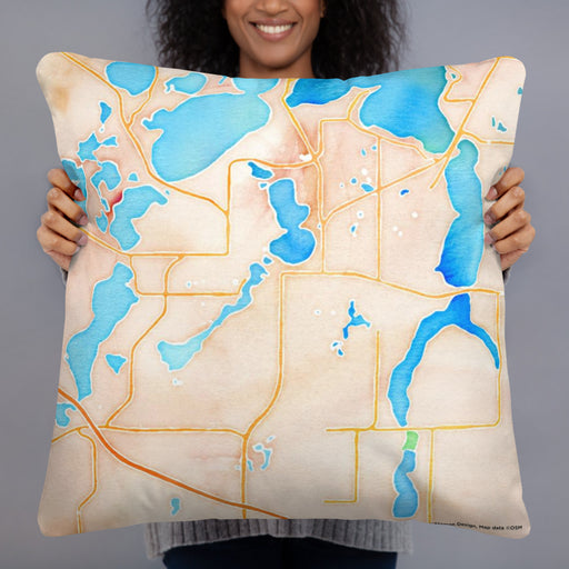 Person holding 22x22 Custom Alexandria Minnesota Map Throw Pillow in Watercolor