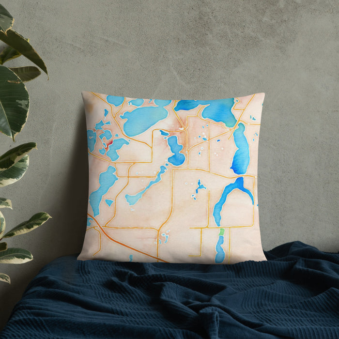 Custom Alexandria Minnesota Map Throw Pillow in Watercolor on Bedding Against Wall
