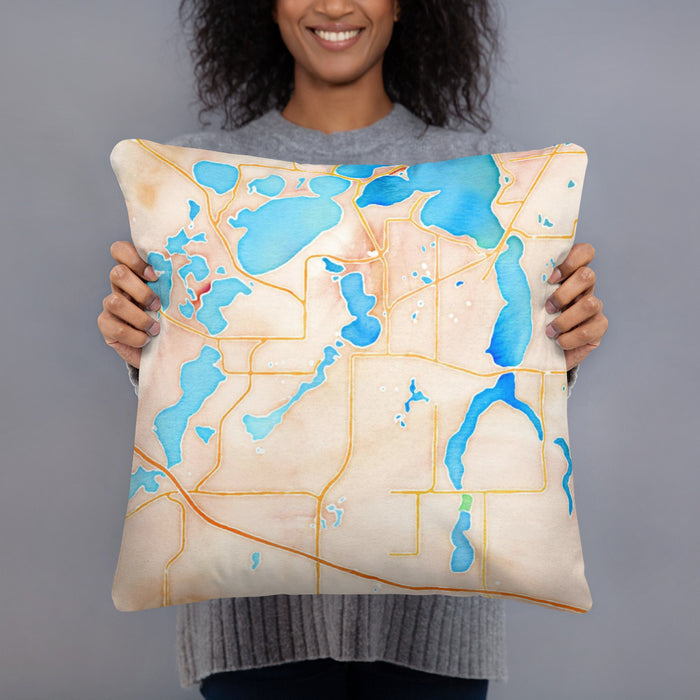 Person holding 18x18 Custom Alexandria Minnesota Map Throw Pillow in Watercolor