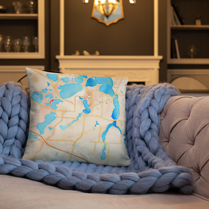 Custom Alexandria Minnesota Map Throw Pillow in Watercolor on Cream Colored Couch