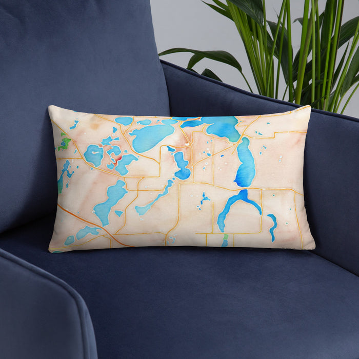 Custom Alexandria Minnesota Map Throw Pillow in Watercolor on Blue Colored Chair