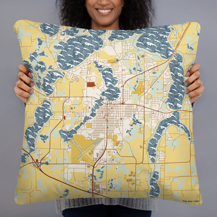 Person holding 22x22 Custom Alexandria Minnesota Map Throw Pillow in Woodblock