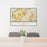 24x36 Alliance Texas Map Print Lanscape Orientation in Woodblock Style Behind 2 Chairs Table and Potted Plant