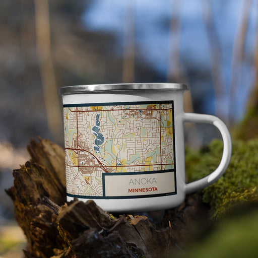 Right View Custom Anoka Minnesota Map Enamel Mug in Woodblock on Grass With Trees in Background