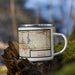 Right View Custom Anoka Minnesota Map Enamel Mug in Woodblock on Grass With Trees in Background