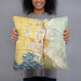 Person holding 18x18 Custom Arcata California Map Throw Pillow in Woodblock