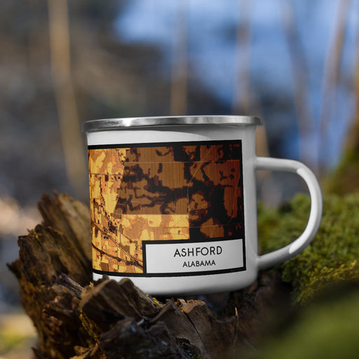 Right View Custom Ashford Alabama Map Enamel Mug in Ember on Grass With Trees in Background
