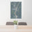 24x36 Augusta Maine Map Print Portrait Orientation in Afternoon Style Behind 2 Chairs Table and Potted Plant