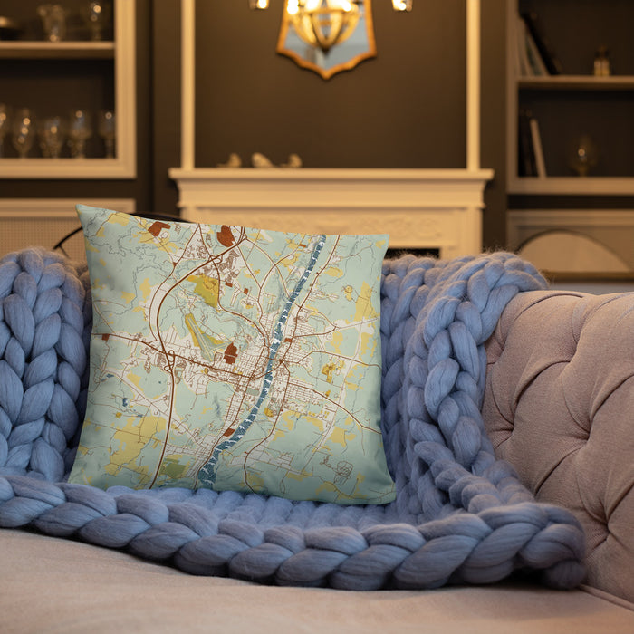 Custom Augusta Maine Map Throw Pillow in Woodblock on Cream Colored Couch