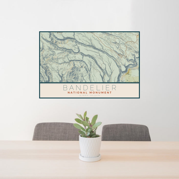 24x36 Bandelier National Monument Map Print Lanscape Orientation in Woodblock Style Behind 2 Chairs Table and Potted Plant