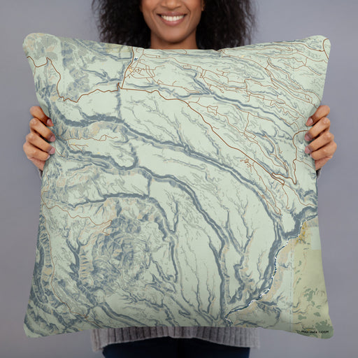 Person holding 22x22 Custom Bandelier National Monument Map Throw Pillow in Woodblock