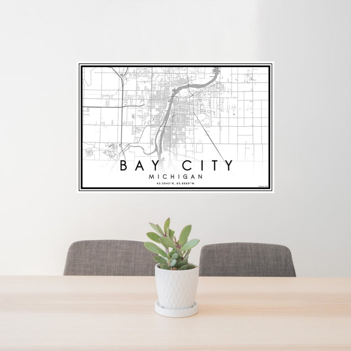 24x36 Bay City Michigan Map Print Lanscape Orientation in Classic Style Behind 2 Chairs Table and Potted Plant
