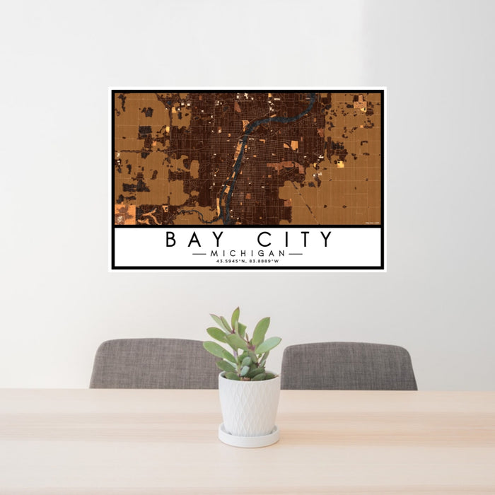 24x36 Bay City Michigan Map Print Lanscape Orientation in Ember Style Behind 2 Chairs Table and Potted Plant
