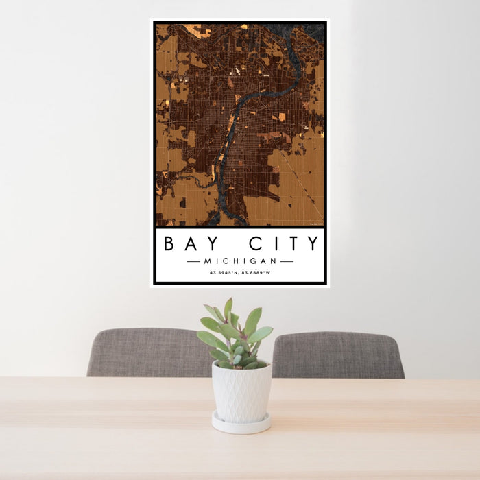 24x36 Bay City Michigan Map Print Portrait Orientation in Ember Style Behind 2 Chairs Table and Potted Plant