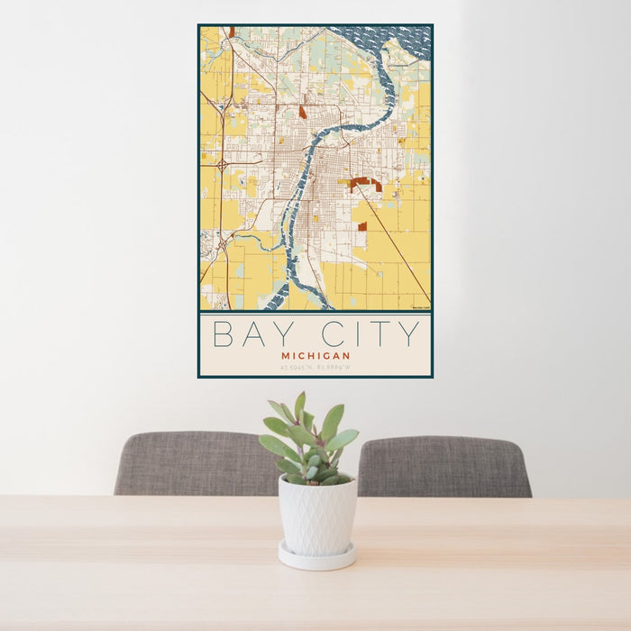 24x36 Bay City Michigan Map Print Portrait Orientation in Woodblock Style Behind 2 Chairs Table and Potted Plant