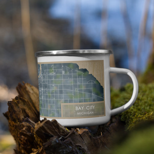 Right View Custom Bay City Michigan Map Enamel Mug in Afternoon on Grass With Trees in Background
