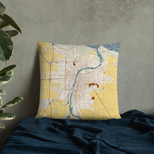 Custom Bay City Michigan Map Throw Pillow in Woodblock on Bedding Against Wall