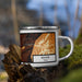 Right View Custom Beaver Utah Map Enamel Mug in Ember on Grass With Trees in Background