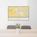 24x36 Bellefontaine Ohio Map Print Lanscape Orientation in Woodblock Style Behind 2 Chairs Table and Potted Plant