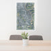 24x36 Bellevue Nebraska Map Print Portrait Orientation in Afternoon Style Behind 2 Chairs Table and Potted Plant