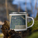 Right View Custom Bemidji Minnesota Map Enamel Mug in Afternoon on Grass With Trees in Background