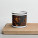 Front View Custom Bemidji Minnesota Map Enamel Mug in Ember on Cutting Board