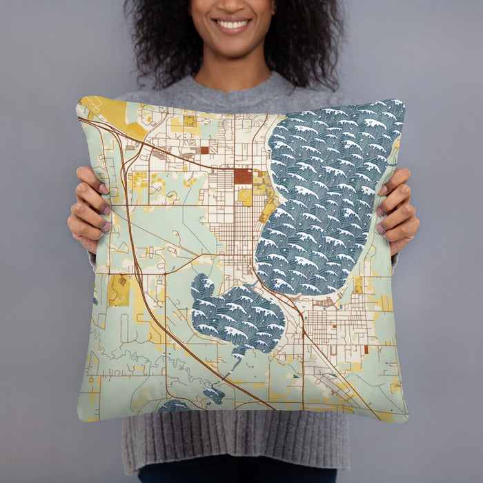 Person holding 18x18 Custom Bemidji Minnesota Map Throw Pillow in Woodblock