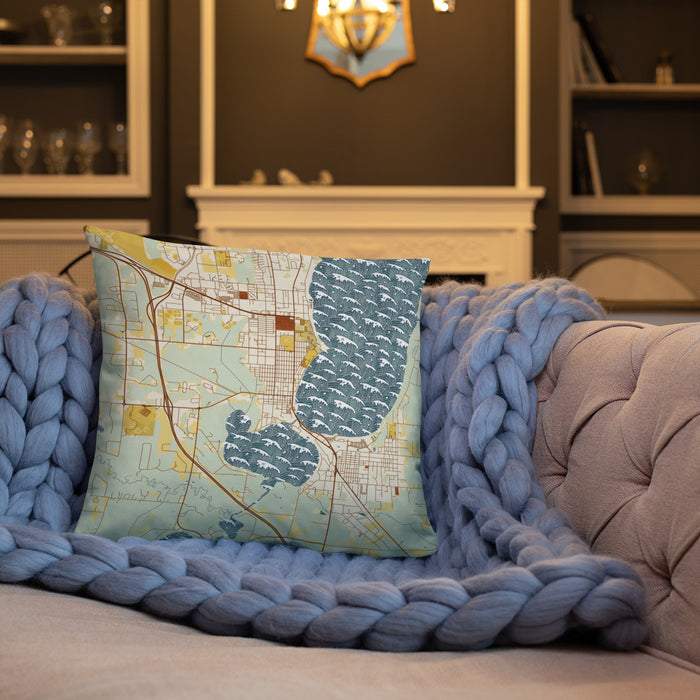 Custom Bemidji Minnesota Map Throw Pillow in Woodblock on Cream Colored Couch