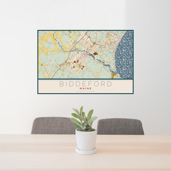 24x36 Biddeford Maine Map Print Lanscape Orientation in Woodblock Style Behind 2 Chairs Table and Potted Plant