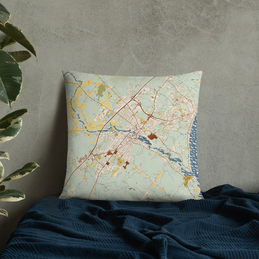 Custom Biddeford Maine Map Throw Pillow in Woodblock on Bedding Against Wall