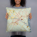 Person holding 18x18 Custom Biddeford Maine Map Throw Pillow in Woodblock