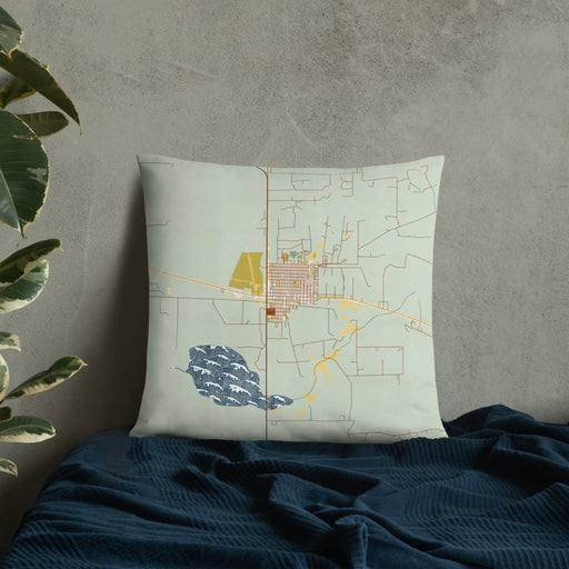 Custom Big Lake Texas Map Throw Pillow in Woodblock on Bedding Against Wall