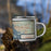 Right View Custom Biloxi Mississippi Map Enamel Mug in Woodblock on Grass With Trees in Background