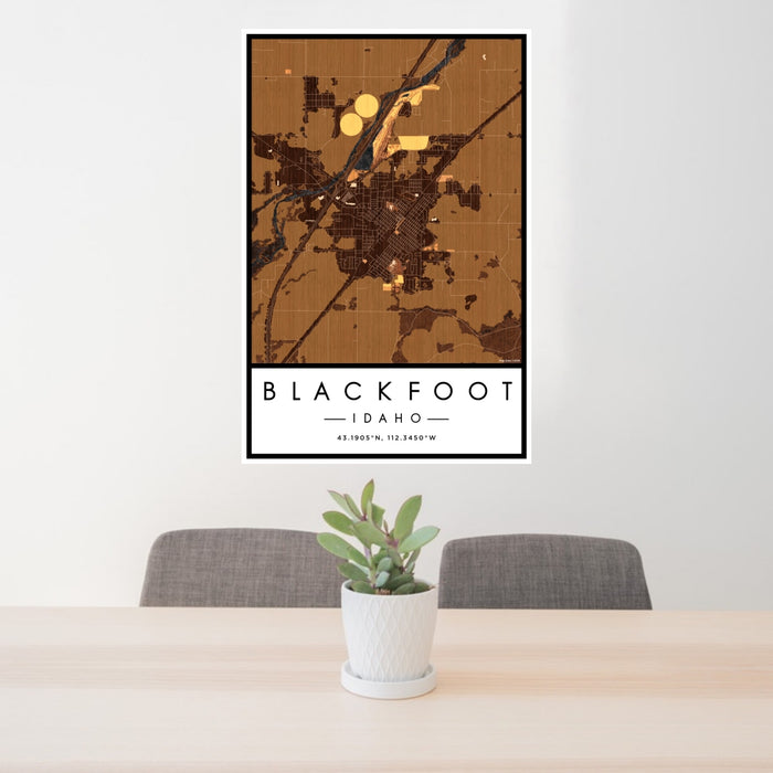 24x36 Blackfoot Idaho Map Print Portrait Orientation in Ember Style Behind 2 Chairs Table and Potted Plant