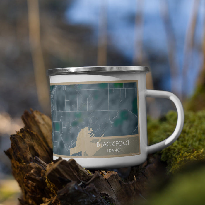 Right View Custom Blackfoot Idaho Map Enamel Mug in Afternoon on Grass With Trees in Background