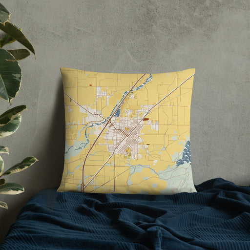 Custom Blackfoot Idaho Map Throw Pillow in Woodblock on Bedding Against Wall