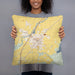 Person holding 18x18 Custom Blackfoot Idaho Map Throw Pillow in Woodblock