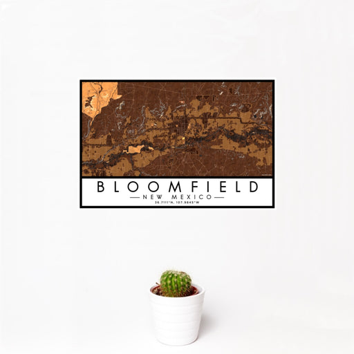 12x18 Bloomfield New Mexico Map Print Landscape Orientation in Ember Style With Small Cactus Plant in White Planter