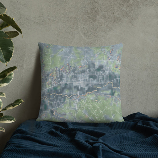 Custom Bloomfield New Mexico Map Throw Pillow in Afternoon on Bedding Against Wall