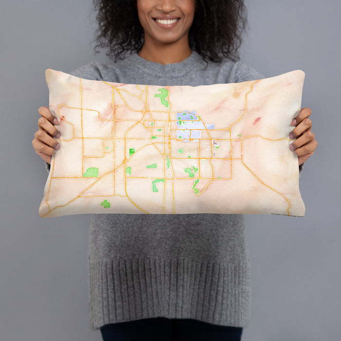 Person holding 20x12 Custom Bloomington Indiana Map Throw Pillow in Watercolor