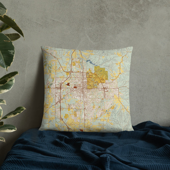 Custom Bloomington Indiana Map Throw Pillow in Woodblock on Bedding Against Wall