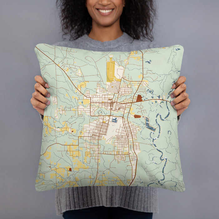Person holding 18x18 Custom Bogalusa Louisiana Map Throw Pillow in Woodblock