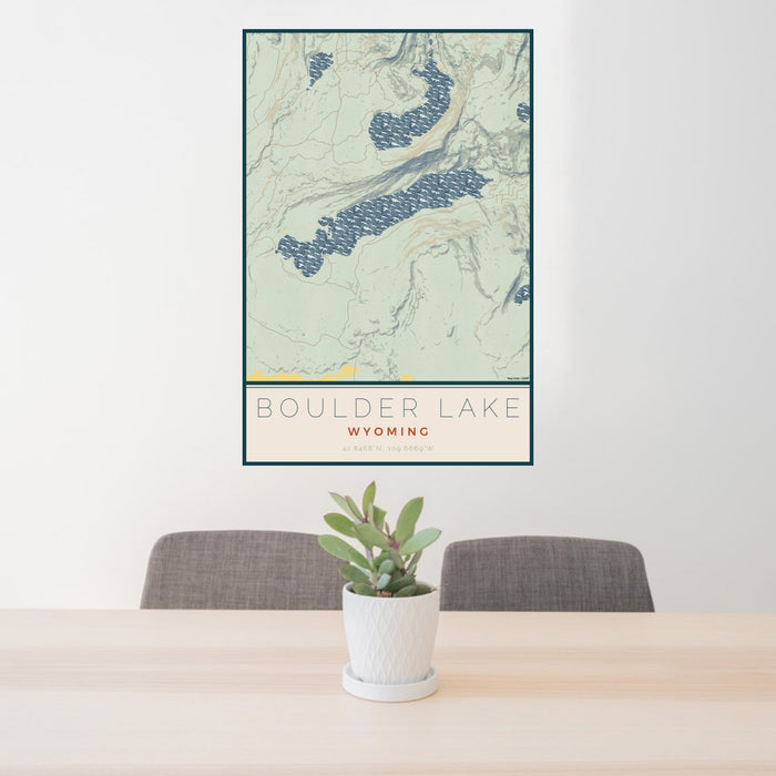 24x36 Boulder Lake Wyoming Map Print Portrait Orientation in Woodblock Style Behind 2 Chairs Table and Potted Plant